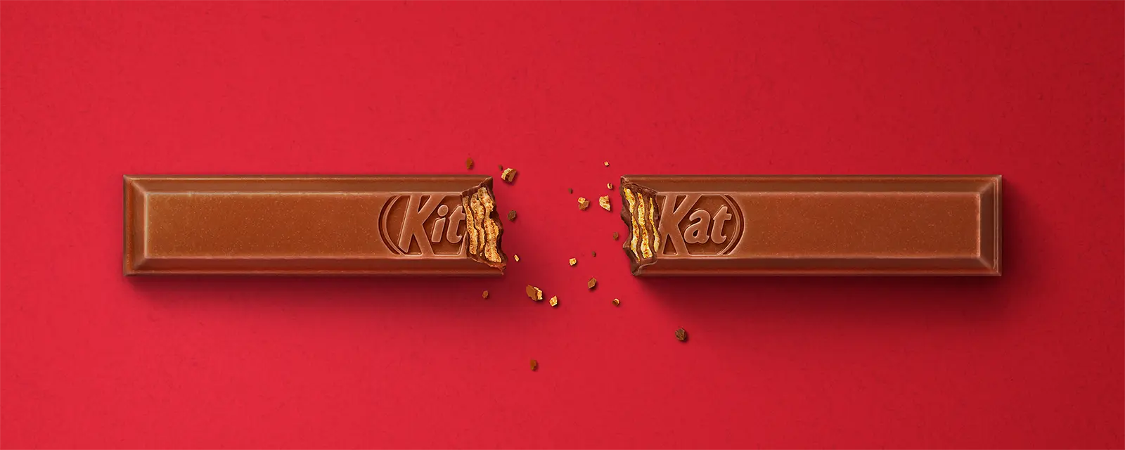 CG renderings of the iconic KitKat bar and packaging for Nestlé's advertising campaign. The signature wafer finger comes to life in hyper-realistic 3D modeled crisp breaks exposing layered texture, glossy chocolate with subtle imperfections and scattered shards, alongside precise recreations of the refreshed wrapper.  Multiple unique variations of the fragmented bars were created to highlight the satisfying snap and indulgent reveal, fuelling high-impact outdoor placements across billboards, bus shelters, and city streets. International award-winning CGI and illustration by Pierre Bourjo.